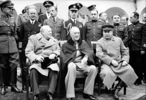 'The Big Three': Winston Churchill, Franklin D Roosevelt and Joseph Stalin sit for photographs during the Yalta Conference in February 1945. NAM 236 Part of WAR OFFICE SECOND WORLD WAR OFFICIAL COLLECTION