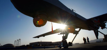 Air War Begins Over Afghanistan, October 7, 2001. Drone Protesters in Court in Missouri, October 7, 2014.